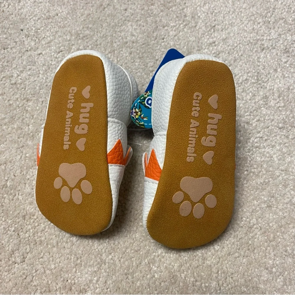 White and Orange Moccasins with Animal Face Design